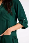 zielona sukienka  asymetryczna z kołnierzykiem.webp