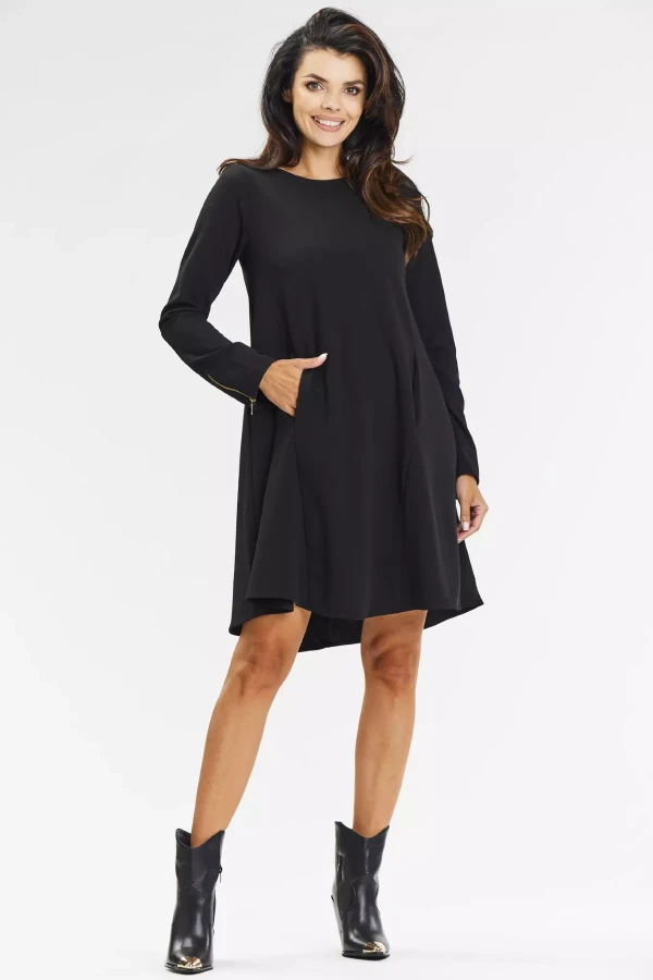 Luźna sukienka midi z kieszeniami na co dzień