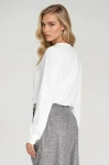Biała bluzka z długim rękawem i stójką..webp