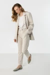 lniane spodnie jasny beż eleganckie.webp