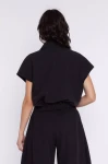 czarny tył eleganckiego żakietu damskiego.webp