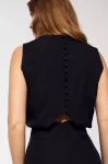 Elegancki kombinezon z dekoracyjnymi guzikami na plecach czarny.webp