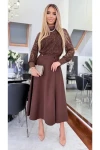Elegancka spódnica midi damska podkreślająca talię.webp