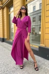 Elegancki kombinezon damski z rękawem 34.webp