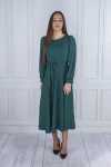 Elegancka sukienka damska midi o rozkloszowanym fasonie.webp