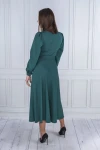 Elegancka sukienka midi z długim rękawem i wiązaniem w talii.webp