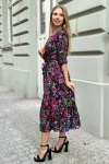 Elegancka sukienka damska midi w kwiatowy wzór.webp