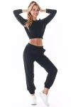 Bluza damska crop z charakterystycznymi przeszyciami.webp