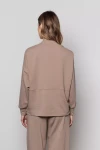 Damska bluza o minimalistycznym designie latte.webp